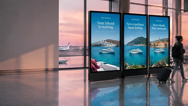 Airport screens showing one ferry campaign adapted for three markets