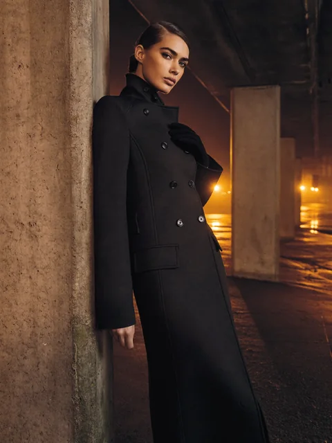 VEYRA After Dark: the double-breasted charcoal coat in a concrete underpass